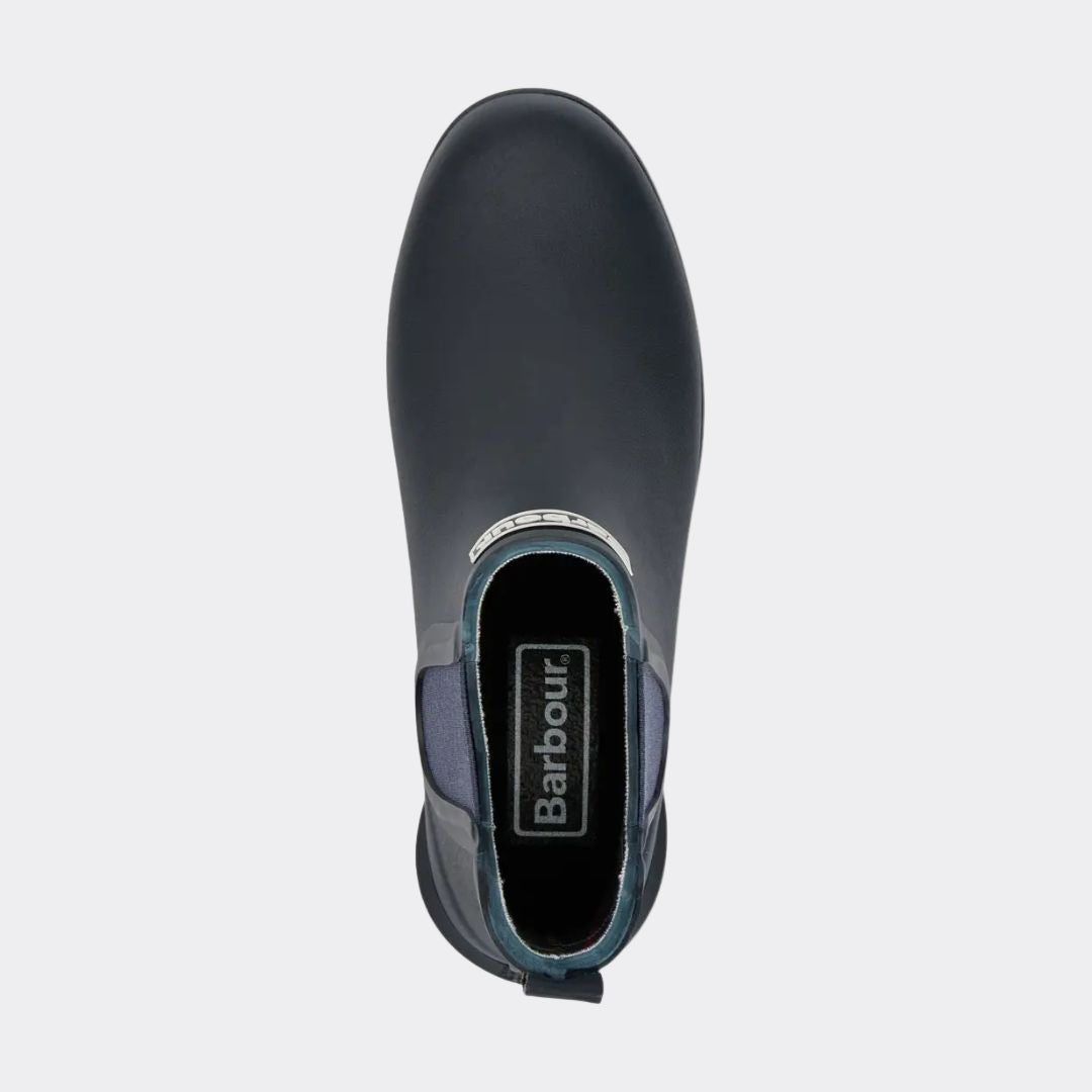 Navy slip-on shoe with brand logo on a white background