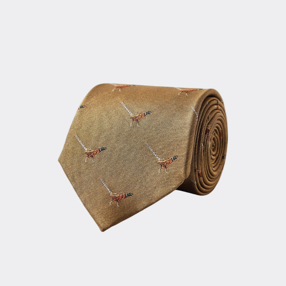 Brown tie with pheasant and dog pattern on a white background