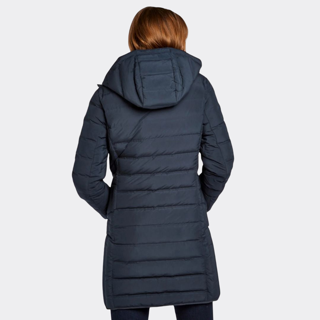 Navy blue puffer coat worn by a person on a white background