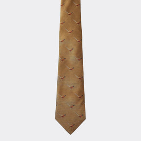 Gold tie with pheasant pattern on a white background
