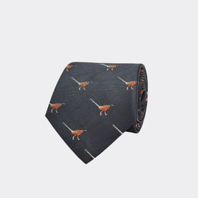 Navy blue tie with orange bird pattern on a white background