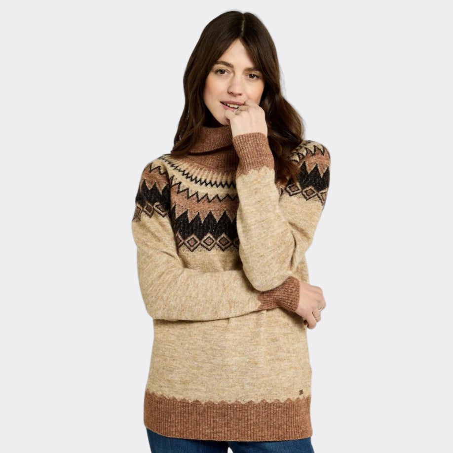 Woman wearing a patterned sweater on a white background