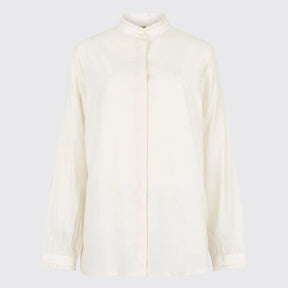 White blouse on a light gray background
