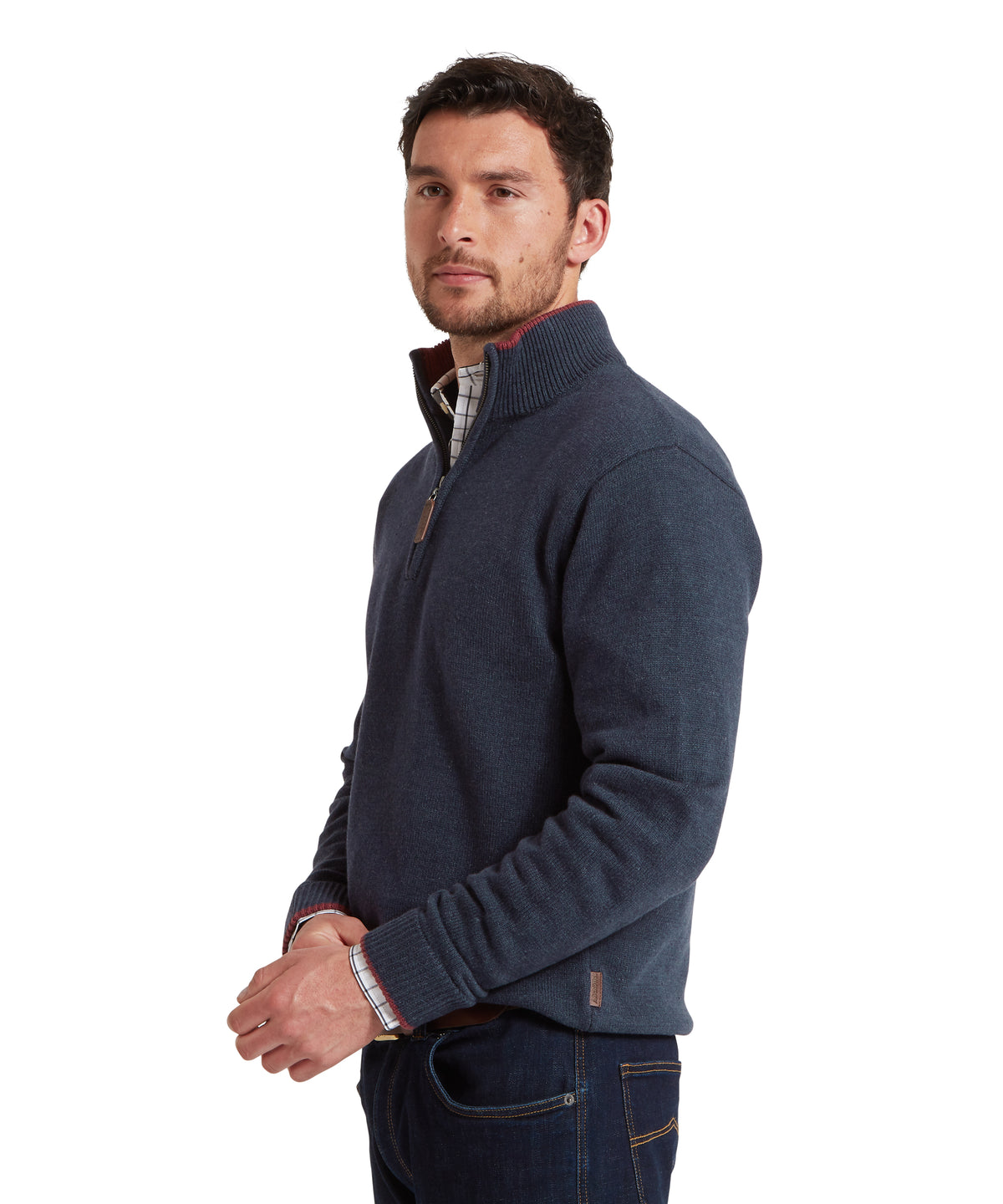 Man wearing a navy blue sweater on a white background